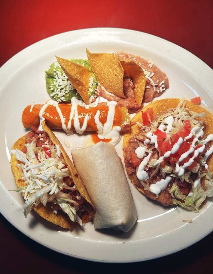 Restaurant plate with Tacos and Burrito