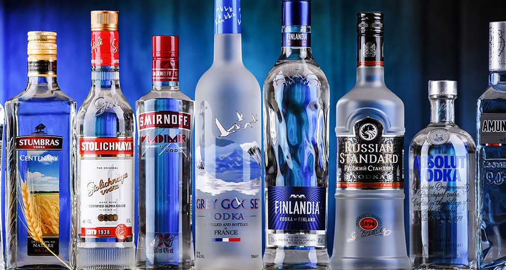 Multiple bottles of different brands of Vodka