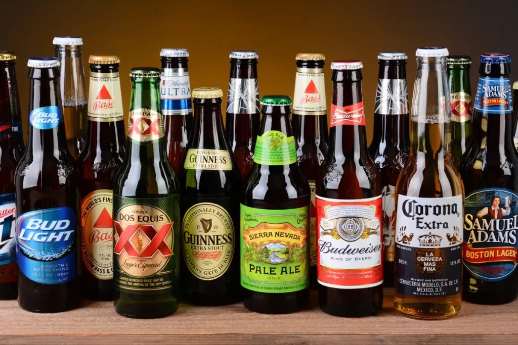 Multiple bottles of different brands of beer